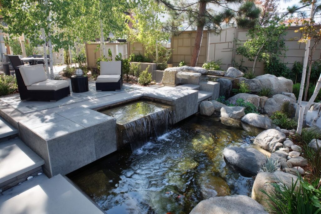 contemporary water feature in backyard oasis