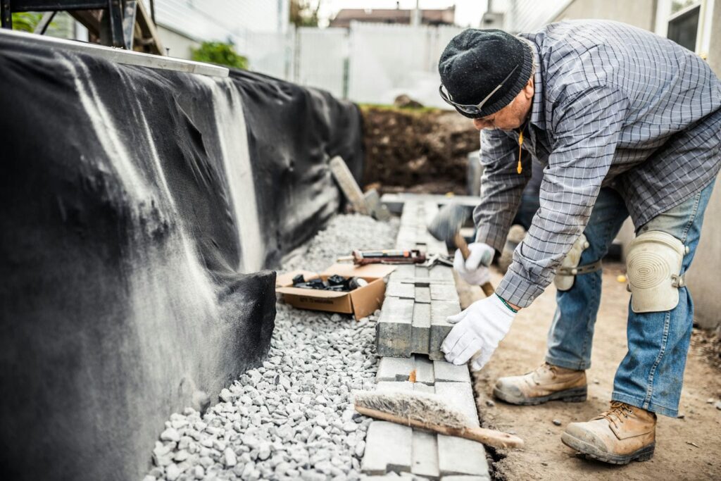 retaining wall contractor at work