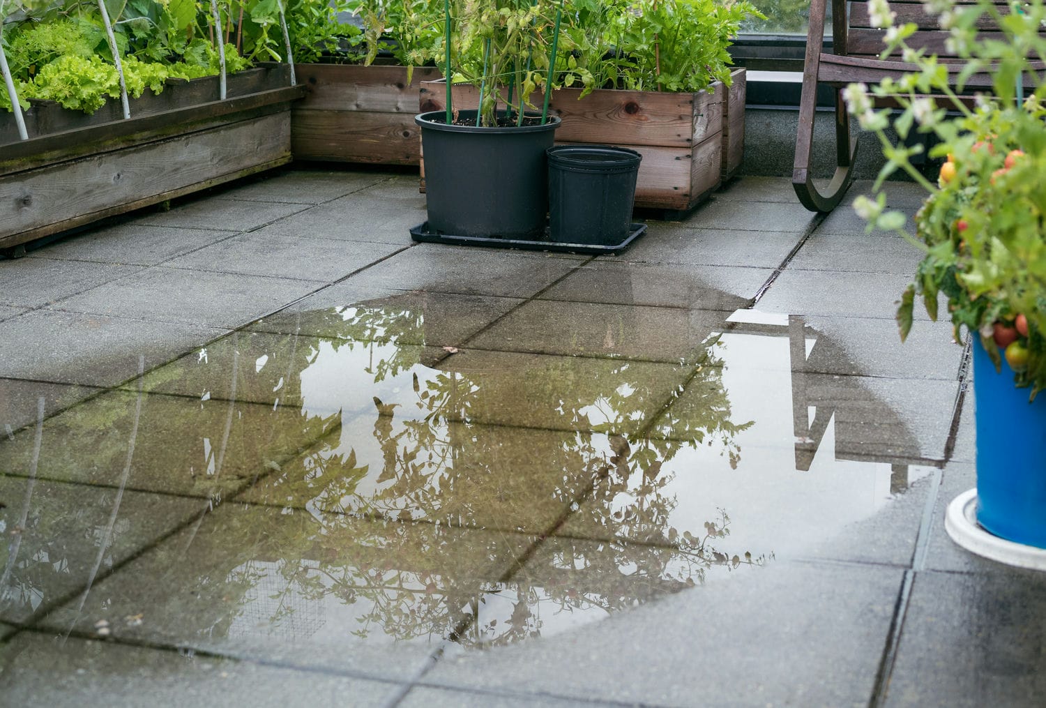 water pooling on paver patio