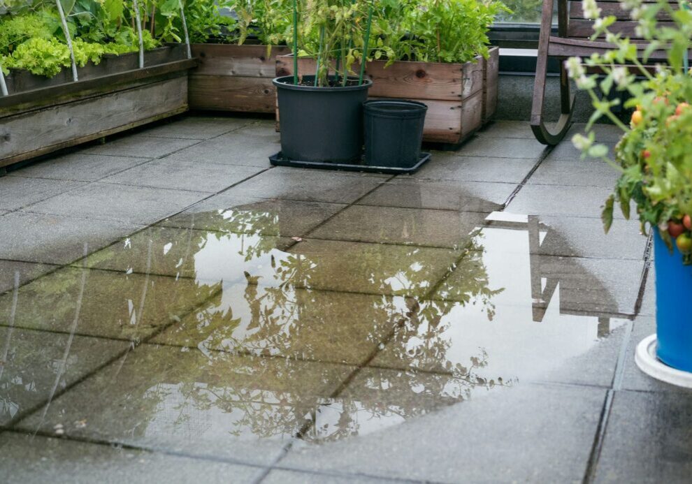 water pooling on paver patio